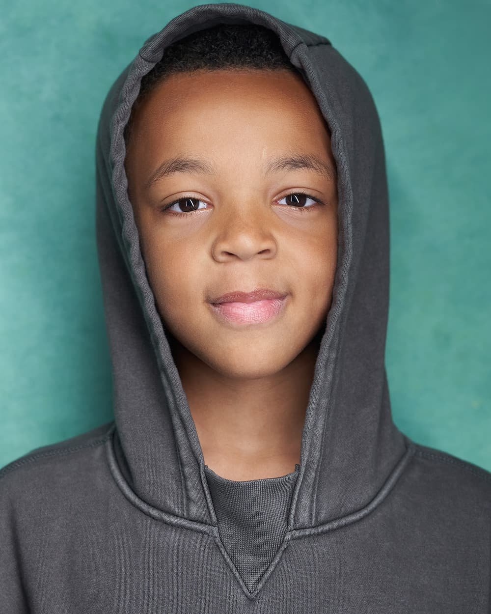 Child Actor Headshot green background